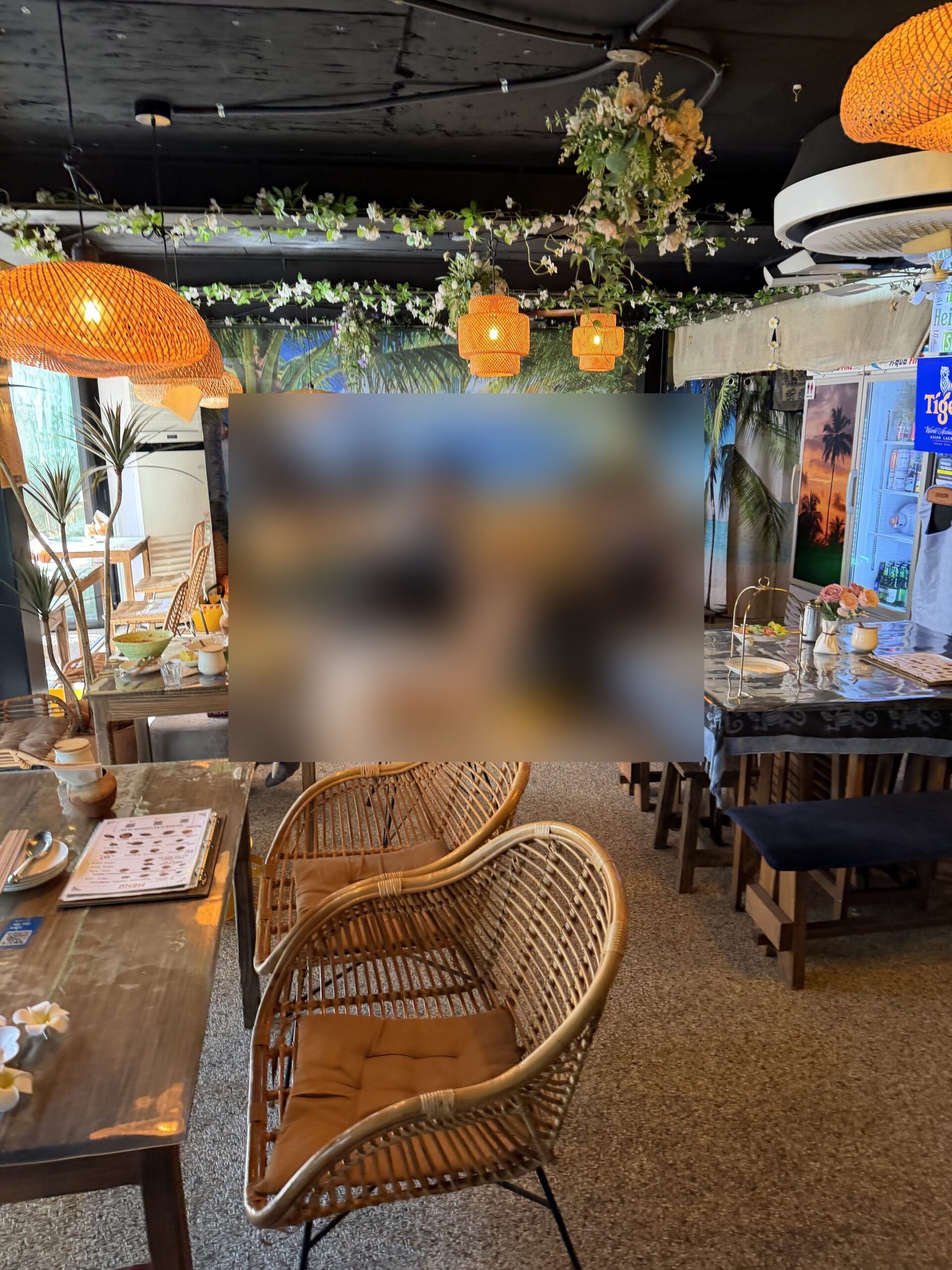 Inside: rattan chairs and warm lights